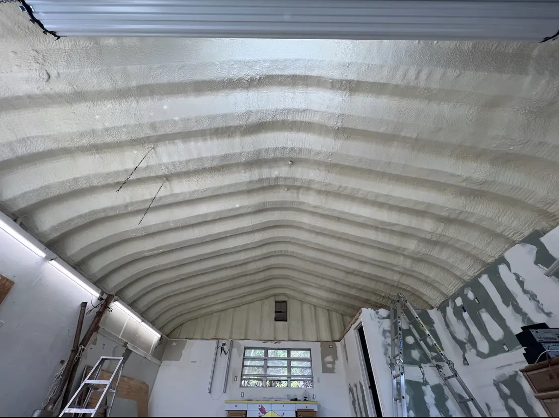 Spray polyurethane foam applied to the underside of a metal roof deck in Port Wentworth